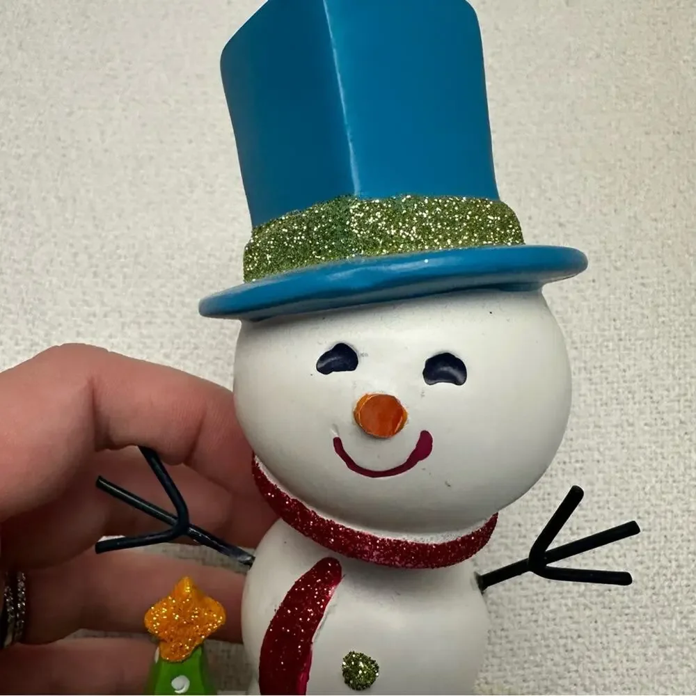 Snowman bobble head stocking holder